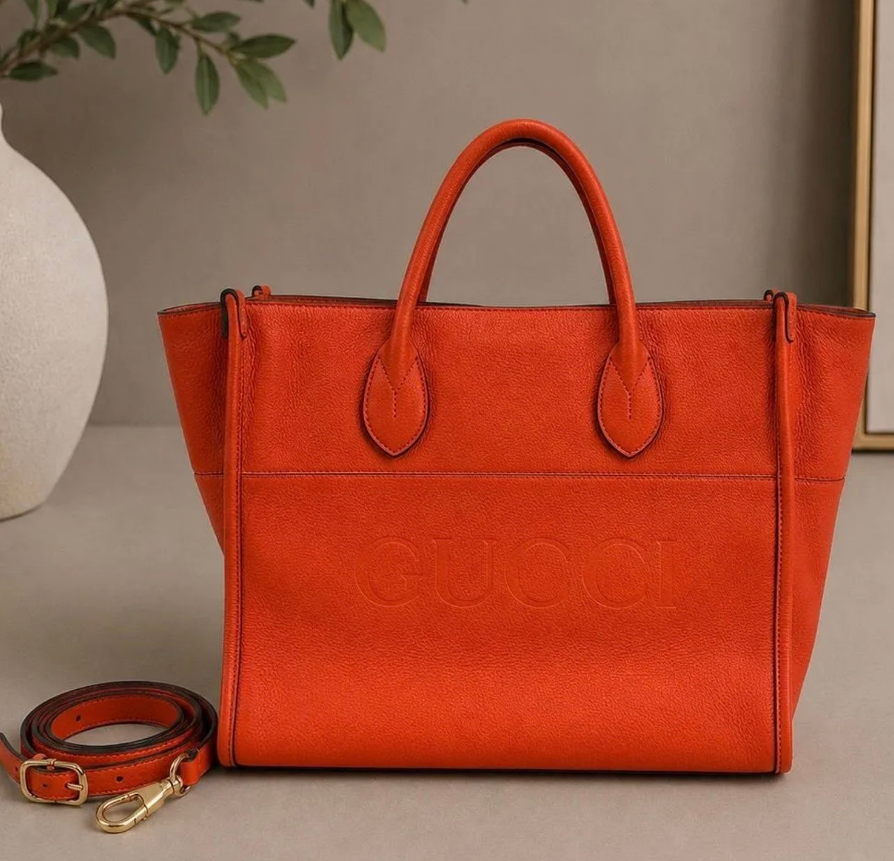 Gucci Embossed Logo Leather Tote | Orange
